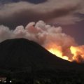 Mount Lokon spews hot lava and volcanic ash during an eruption in Tomohon in Indonesia's North Sulawesi province