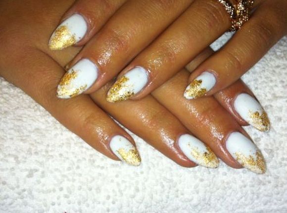 10. Elegant Gold Leaf Nail Design - wide 8